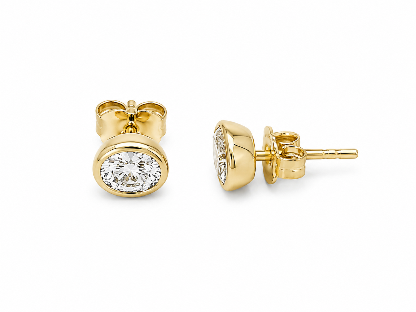 0.75ct Oval Lab-Grown Diamond Bezel-Set Stud Earrings in 10ct Yellow Gold, view 1