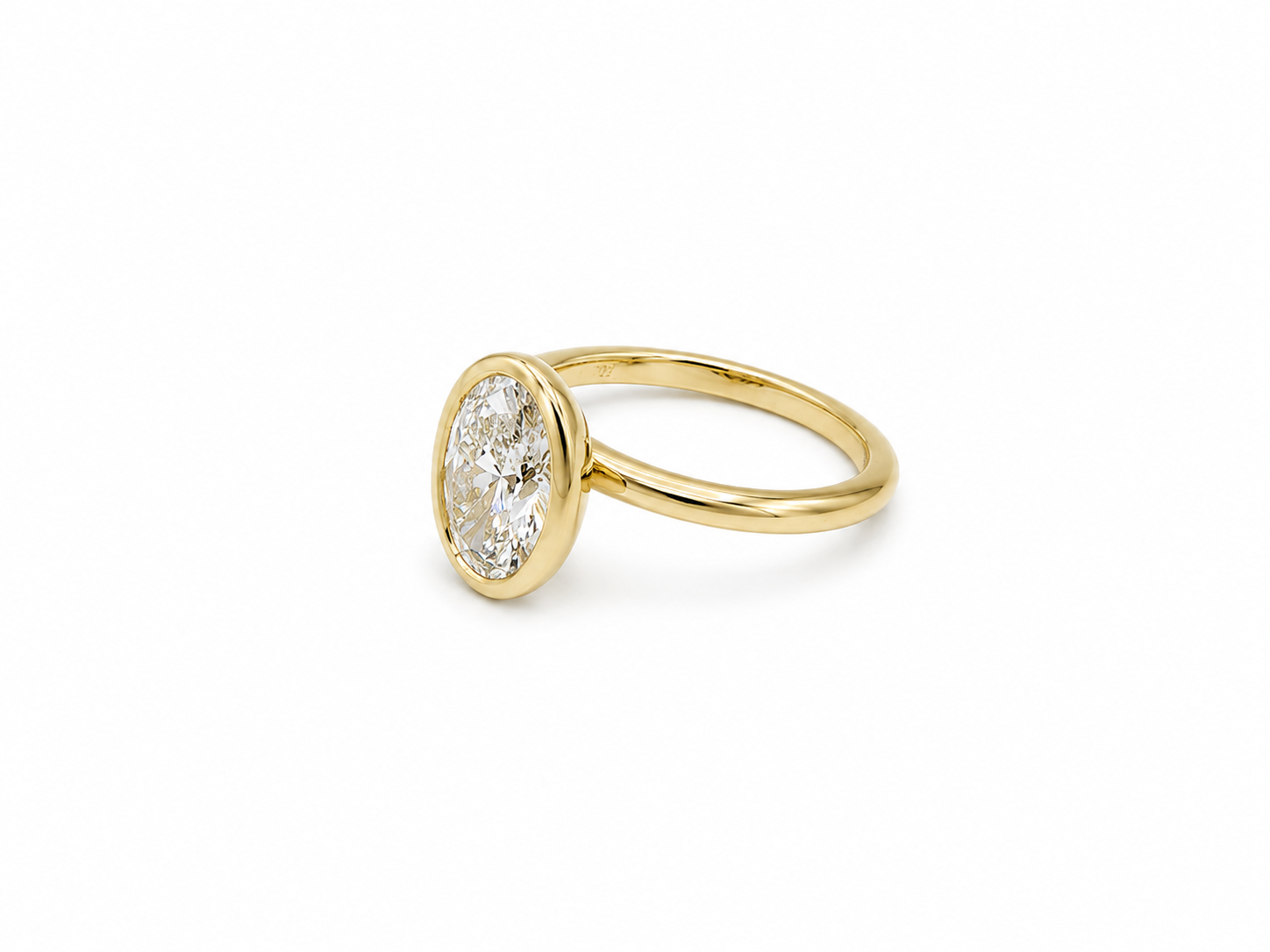 2.06ct Oval Lab-Grown Diamond Bezel-Set Engagement Ring in 18ct Yellow Gold, view 2